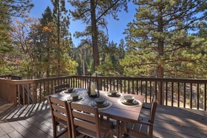 Dine under the stars on our serene wooden deck, surrounded by nature's beauty.