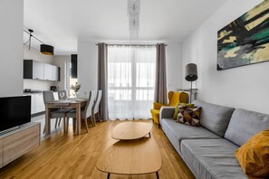Main Living Area with a Smart TV | Book Now with RENTUJEMY.COM