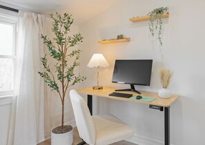 Standing desk, chair, computer monitor, lamp - your ideal WFH setup!
