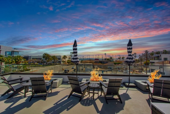 Enjoy your private 3rd level patio of 180 degree clear ocean views, sunset, Catalina Island and the iconic Huntington Beach Pier