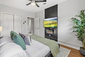 Bedroom 1 - Indoor Fire Place / Flat screen smart TV