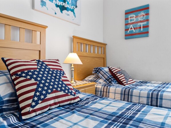 This cozy room is perfect for both kids and adults, with a relaxed atmosphere that's designed for rest and relaxation.