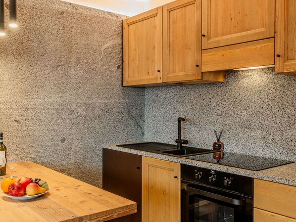 Countertop, Kitchen, Cabinetry, Flooring, Interior Design, Plumbing Fixture, Kitchen Appliance, Tap, Kitchen Sink, Major Appliance