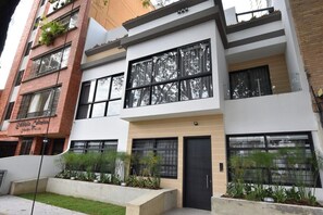 The Granada Executive Suites building facade.