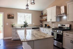 Kitchen with amenities.
