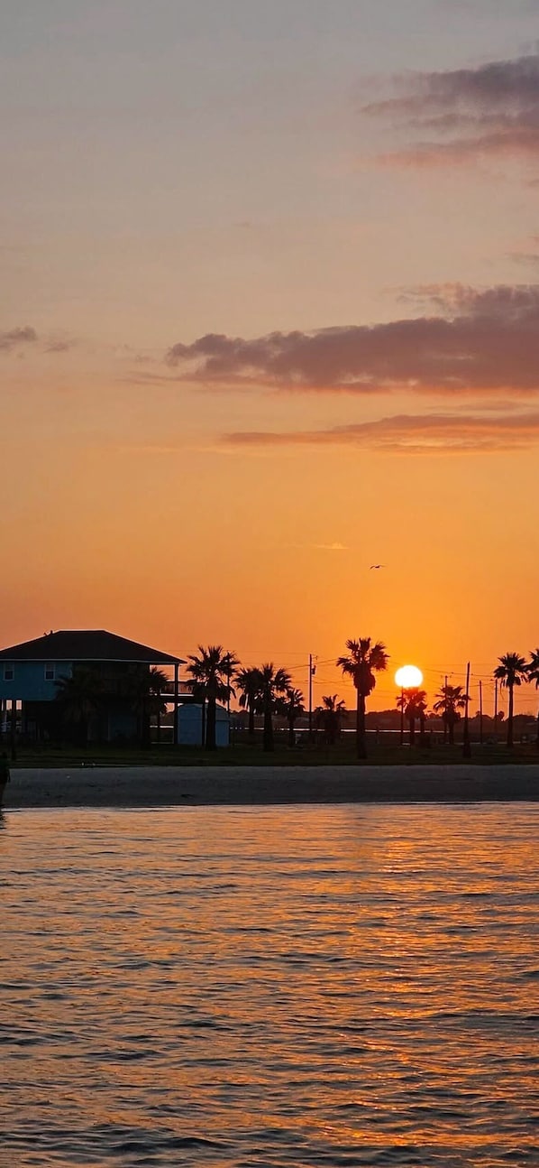 From public pier of the house & sunset in April. Photo credit to Scott Risden.