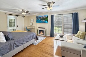 Welcome to the Eagle's Nest master suite equipped with seating area, fire place, TV, ensuite bath with jetted tub and pack-n-play