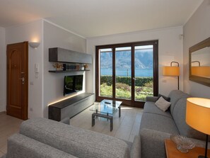 Flooring, Interior Design, Floor, Apartment, Balcony, Ceiling, Condominium, Chair, Shade, Porch