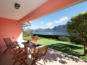 Flooring, Interior Design, Floor, Apartment, Balcony, Ceiling, Condominium, Chair, Shade, Porch