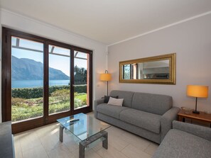 Flooring, Interior Design, Floor, Apartment, Balcony, Ceiling, Condominium, Chair, Shade, Porch