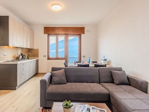 Flooring, Interior Design, Floor, Apartment, Balcony, Ceiling, Condominium, Chair, Shade, Porch