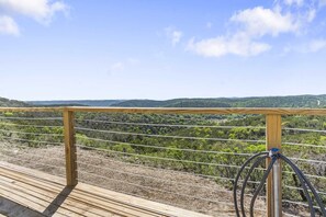 Take in stunning panoramic views of the Texas Hill Country from your own private deck retreat.