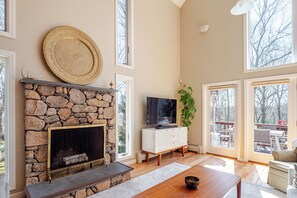 Living room, soaring cathedral ceilings and natural light
