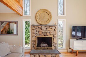 Living room, soaring cathedral ceilings and natural light