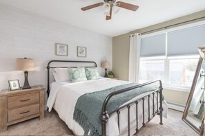 Bedroom 2 w a queen size bed and 43" TV