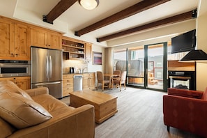 Living/Kitchen Area with Queen Sofa Sleeper
