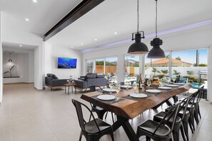 A space for connection. This dining area is ready for your next gathering.