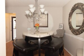 Dining area with restaurant like seating for six.