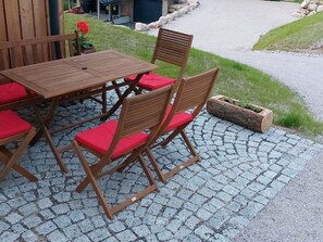 Furniture, Outdoor Furniture, Chair, Table, Outdoor Table, Flagstone, Patio, Folding Chair, Wood Stain, Hardwood