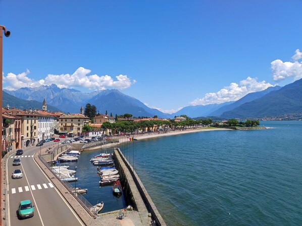 Sky, Mountainous Landforms, Body Of Water, Cloud, Mountain, Coastal And Oceanic Landforms, Hill, Coast, Horizon, Highland