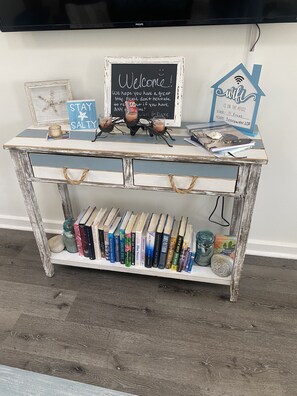 little cottage library with books for adults and toddlers