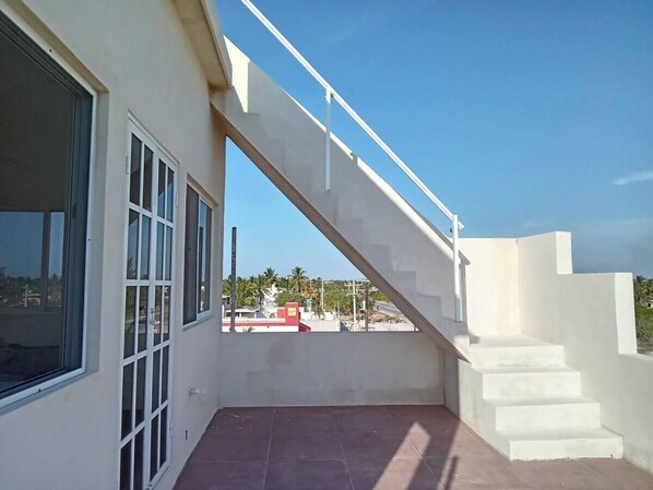 Stairway to 4th floor rooftop deck