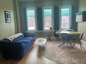 Relax in our luxurious, art-infused apartment.