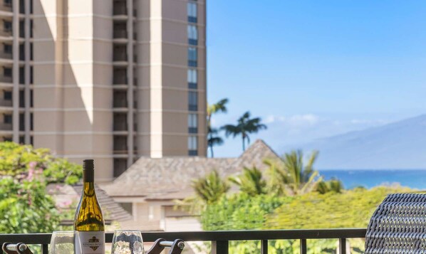 Private Lanai with a partial ocean view.