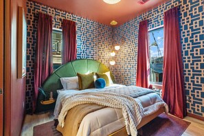 Elegant and sophisticated bedroom featuring rich colors and textures for a truly relaxing retreat