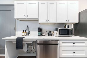 Charming and Practical Cozy Kitchen with the essentials for an effortless stay – microwave, toaster, fridge and coffee maker 