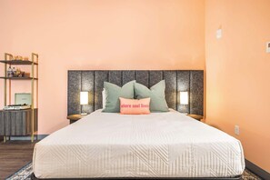 Drift into comfort on a cozy queen bed, complete with plush pillows and premium linens for a restful night's sleep