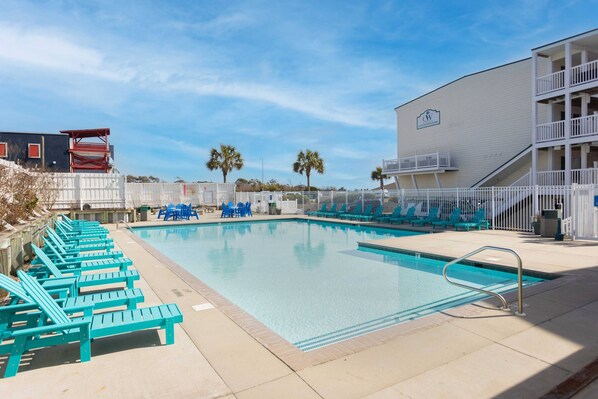 Large Pool with plenty of lounge chairs