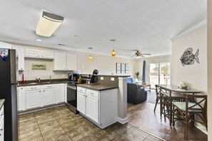 View of Kitchen leading to family sitting area