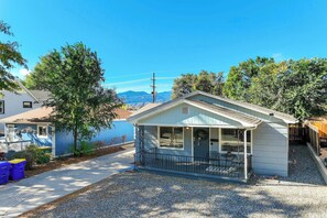 Spacious driveway and charming exterior welcome you to your stylish home-away-from-home in Colorado Springs.