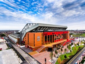 Why not visit Anfield Stadium- the home of the KOP?