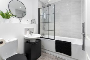 Full Bathroom:

- Sink
- Toilet
- Electric Shower-over-Bath
