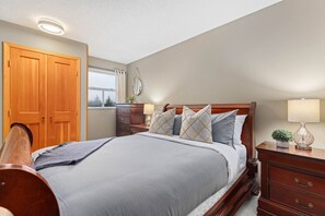 Primary Bedroom features a queen Bed, ensuite bathroom, and large storage closet