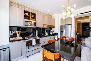 Sleek and fully-equipped kitchen