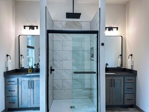 Master shower is a walk in with rain head and some island scented soaps. 