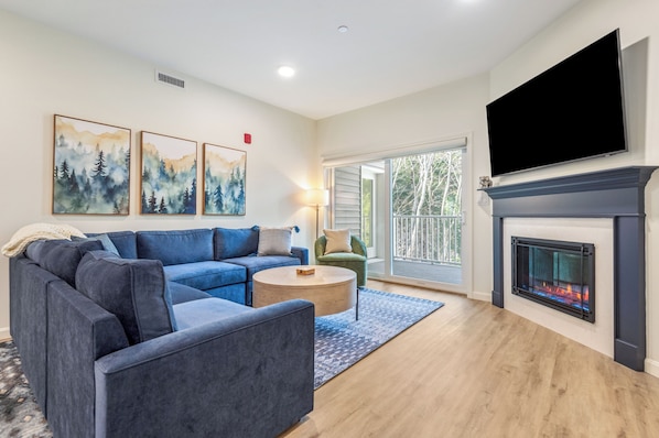 Bright living room opens to the balcony!