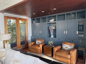 Sitting area in living room with French doors