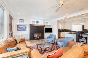 Sitting area with fireplace and TV