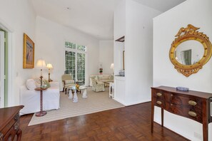The entryway into the home opens up into a foyer, and the Great Room. 