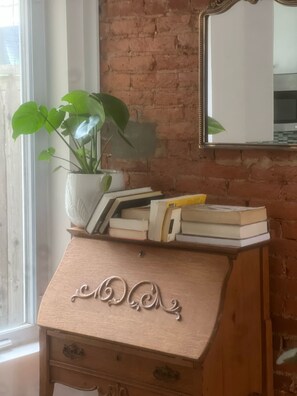 Minimalist dining space, perfect for cozy meals or work, with vintage charm.