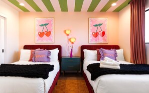 5th Bedroom featuring 2 Full beds and a closet.