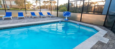 Relax by the expanded pool with a basketball hoop! Enjoy 6 lounge chairs, side tables, and an outdoor dining area—everything you need for the perfect getaway.