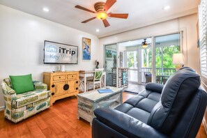 Gather with family and friends for a cozy movie night, sinking into the comfortable living room seating after a day of island adventures.