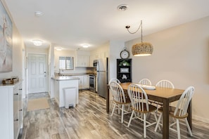 Cozy kitchen and dining area, perfect for enjoying meals together.