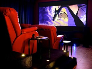 Nine seat cinema with stadium seating, reclining seats and surround sound