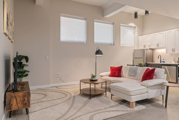 As you take a seat in the living room, the comfortable furniture and tasteful design make it easy to unwind.